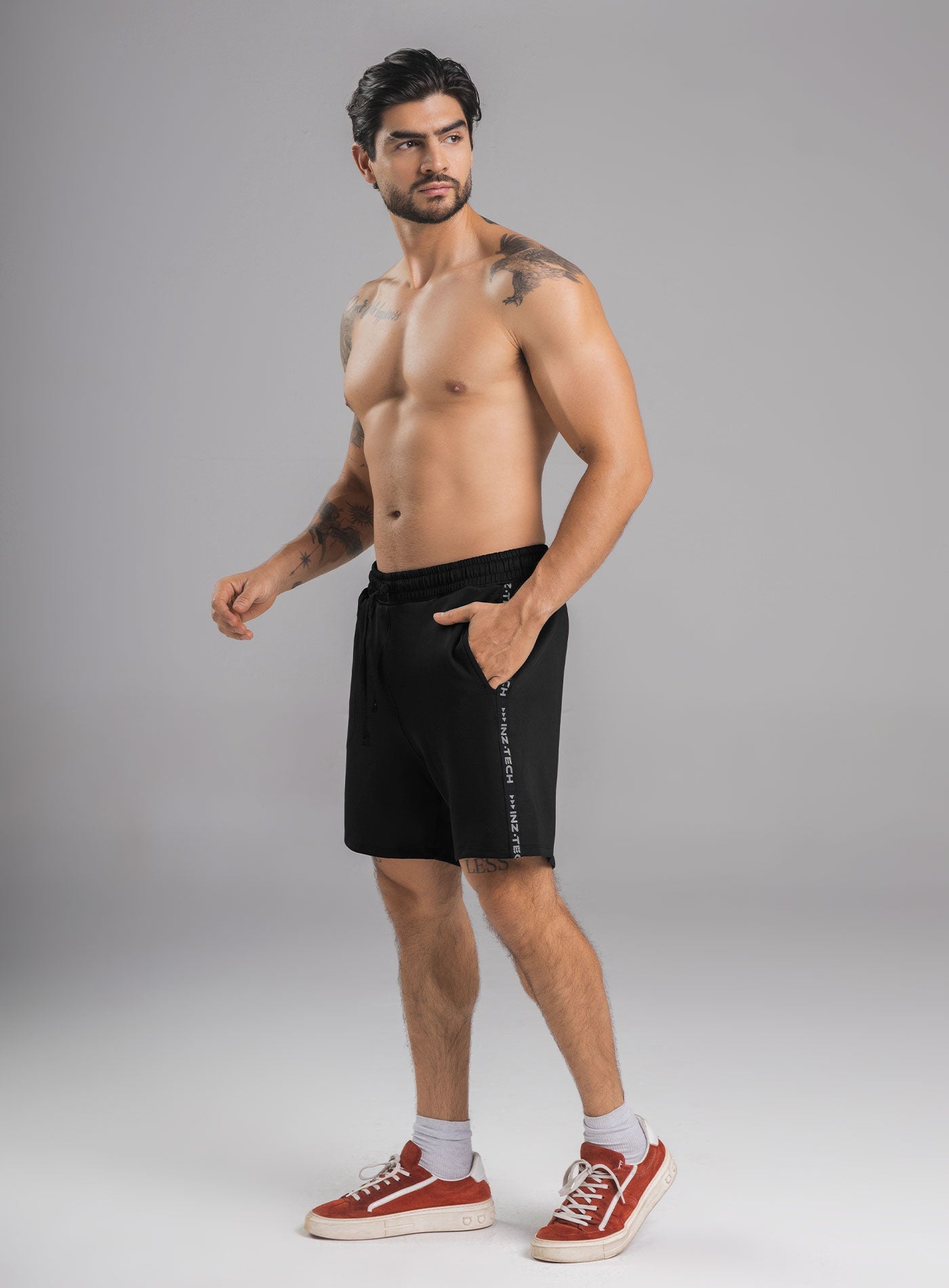 PANTALONETA DEPORTIVA EN TELA BURDA CON CIERRE TERMO SELLADO