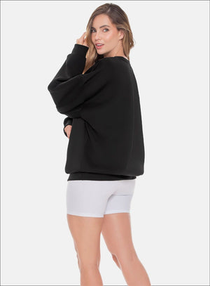 Buzo deportivo color negro para mujer, marca BABALÚ, referencia 109023, vista lateral. Compra al por mayor en int.babalu.com.co en USD.