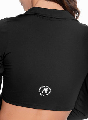Buzo deportivo color negro para mujer, marca BABALÚ, referencia 109263, vista trasera. Compra al por mayor en int.babalu.com.co en USD.