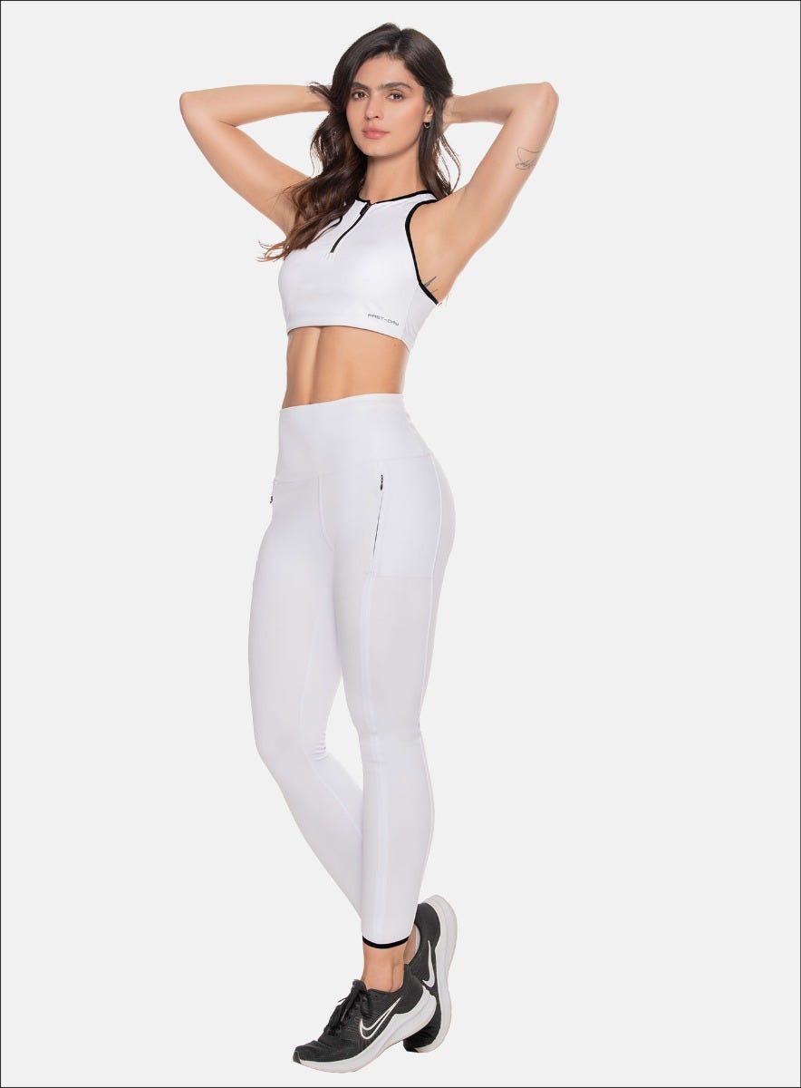LEGGINS DEPORTIVO DAMA CON BOLSILLOSEN COSTADOS CON CIERRE INVISIBLE ENLATERALES ELANTEROS, CON RUEDO CON SESGO EN CONTRASTE