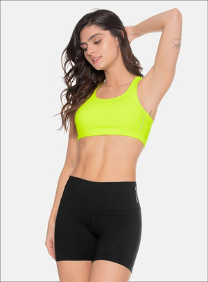 Top deportivo color amarillo neon para mujer, marca BABALÚ, referencia 97293, vista frontal. Compra al por mayor en int.babalu.com.co en USD.