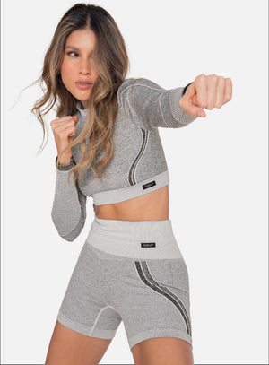 Top deportivo color blanco para mujer, marca BABALÚ, referencia 111923, vista frontal. Compra al por mayor en int.babalu.com.co en USD.