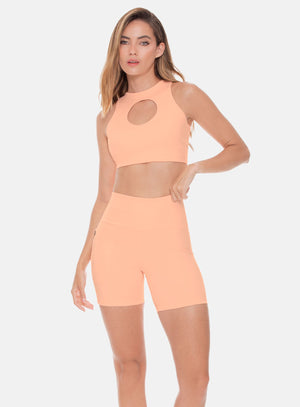 Top deportivo color melon para mujer, marca BABALÚ, referencia 108813, vista frontal. Compra al por mayor en int.babalu.com.co en USD.