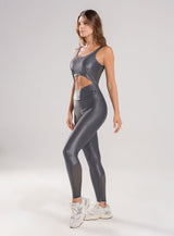 ENTERIZO DEPORTIVO TELA APARIENCIA CUERO CON CIERRE