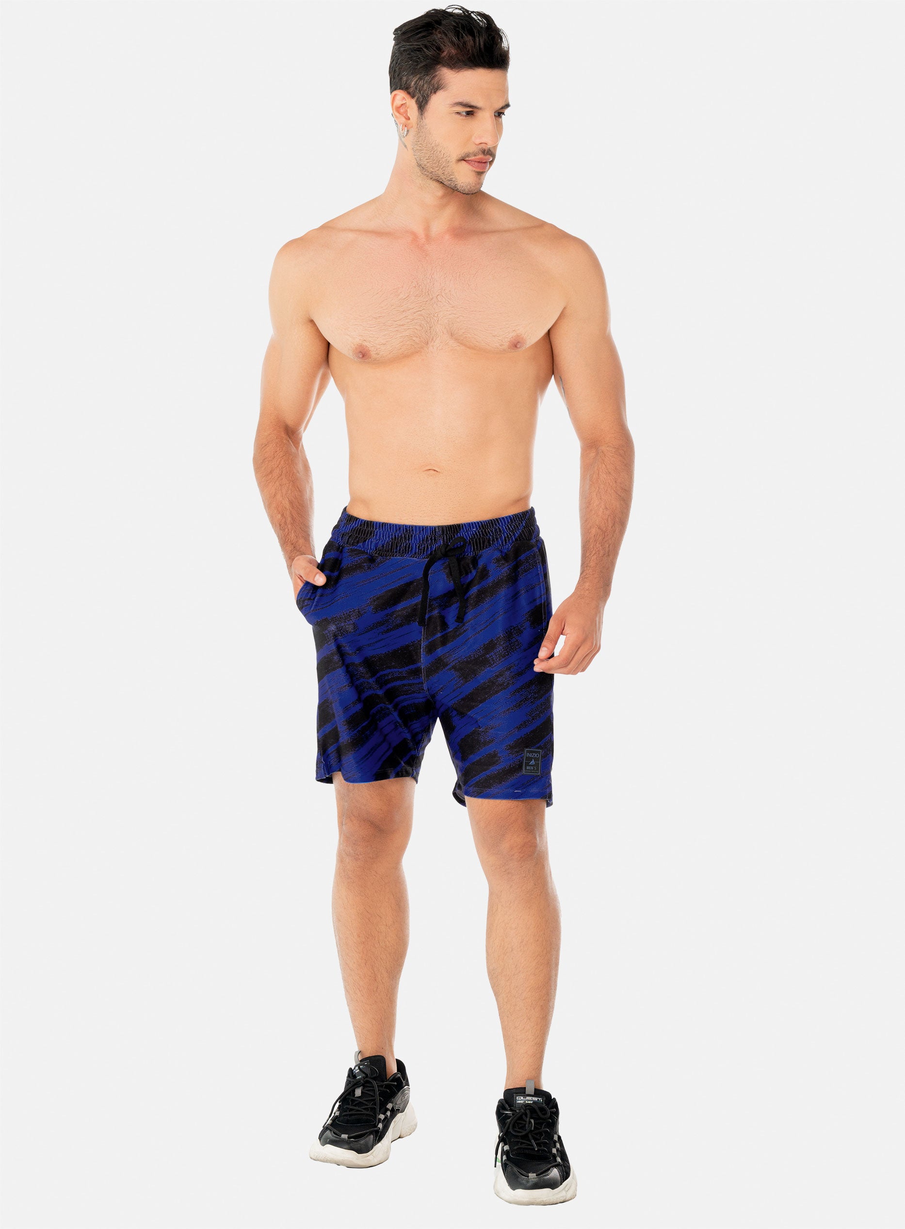 PANTALONETA DEPORTIVA  POLIÉSTER CON SHORT INTERNO