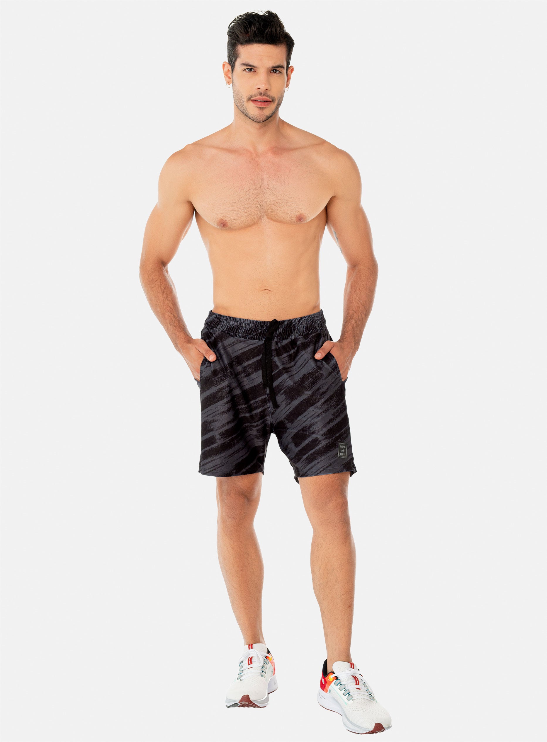 PANTALONETA DEPORTIVA  POLIÉSTER CON SHORT INTERNO