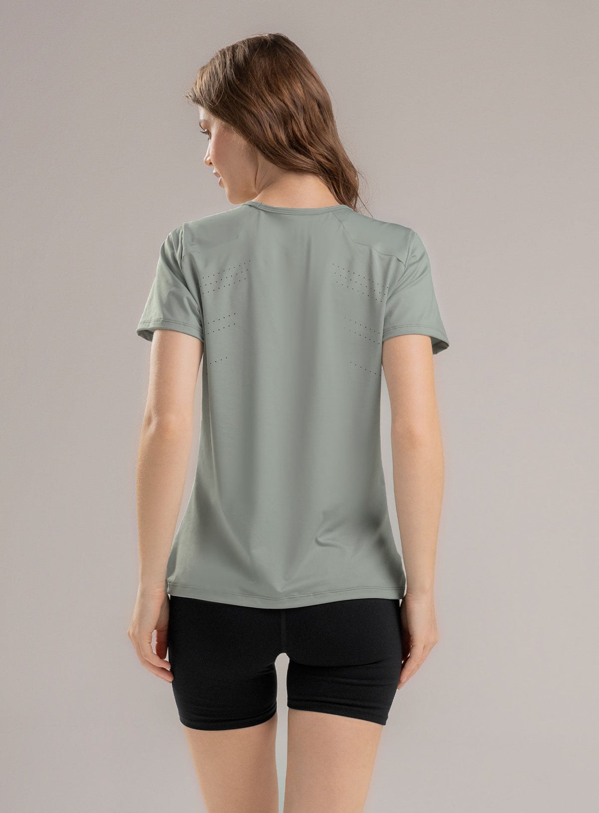 Camiseta deportiva color verde para mujer, marca BABALÚ, referencia 113793, vista trasera. Compra al por mayor en int.babalu.com.co en USD.