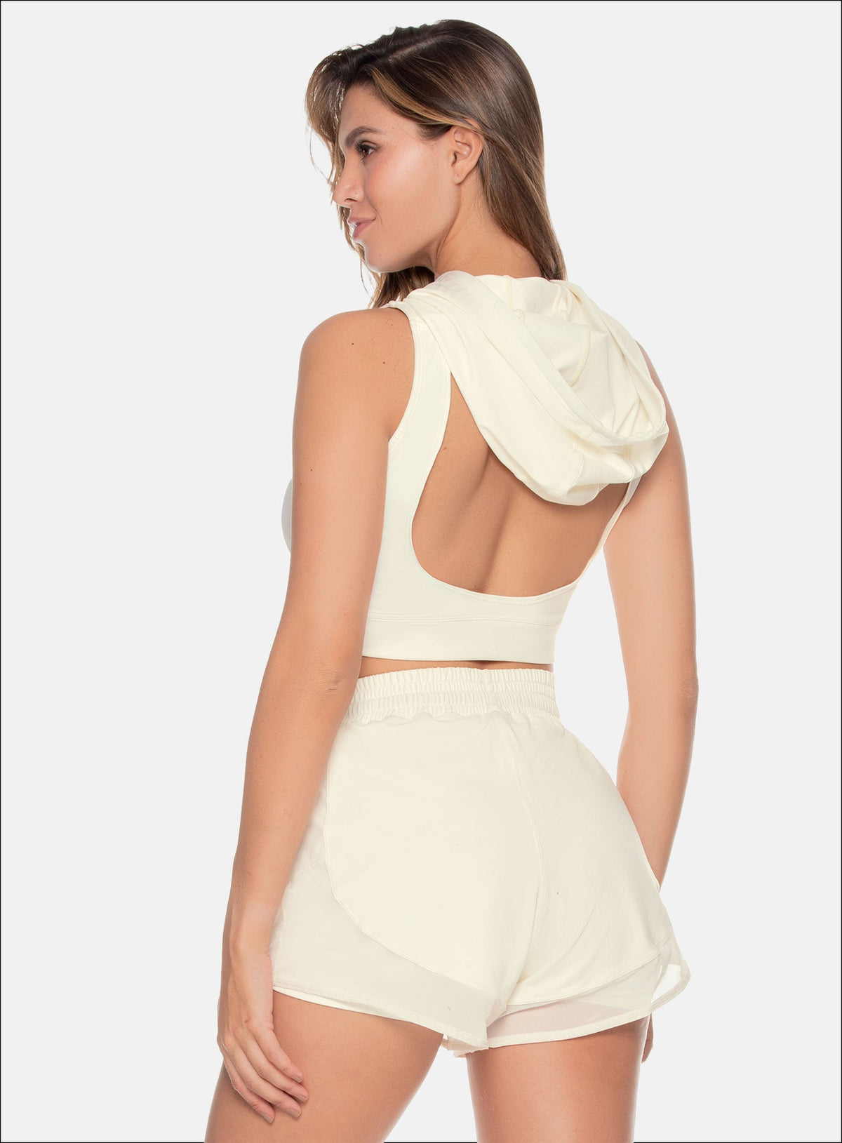 Chaleco deportivo color marfil para mujer, marca BABALÚ, referencia 109433, vista trasera. Compra al por mayor en int.babalu.com.co en USD.