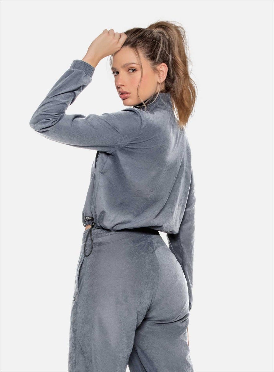 CHAQUETA DEPORTIVA SEMI IMPERMEABLE POLIÉSTER