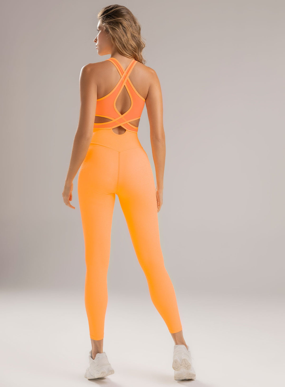 Enterizo deportivo color coral para mujer, marca BABALÚ, referencia 113773, vista trasera. Compra al por mayor en int.babalu.com.co en USD.