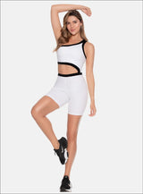 ENTERIZO DEPORTIVO UNA MANGA CON VIVOS EN CONTRASTE Y ABERTURA EN CINTURA QUE MUESTRA PIEL