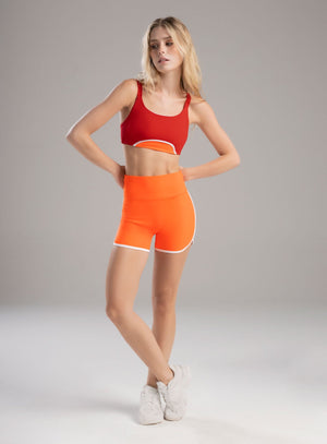 Short deportivo color naranja para mujer, marca BABALÚ, referencia 112863, vista frontal. Compra al por mayor en int.babalu.com.co en USD.
