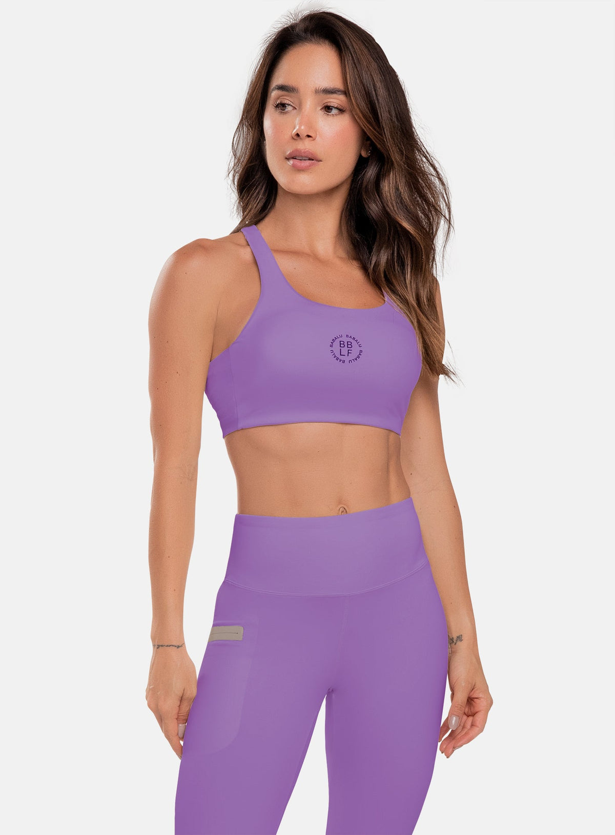 Top deportivo color morado para mujer, marca BABALÚ, referencia 111073, vista frontal. Compra al por mayor en int.babalu.com.co en USD.