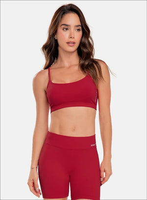 Top deportivo color rojo para mujer, marca BABALÚ, referencia 15943, vista frontal. Compra al por mayor en int.babalu.com.co en USD.