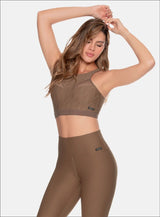 TOP DEPORTIVO EN TELA JACQUARD CON SULIMADO EN FIGURA GEOMETRICA