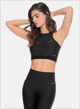 TOP DEPORTIVO EN TELA JACQUARD CON SULIMADO EN FIGURA GEOMETRICA