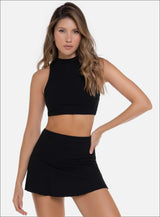 TOP DEPORTIVO CUELLO ALTO TELA RIB